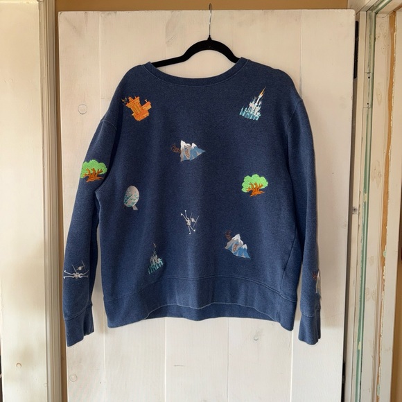 Disney Tops - Disney Parks Disney World Rare Blue Embroidered Ride Icon Sweatshirt Size Lg